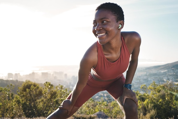 black-woman-stretching-fitness-earphones-nature-workout-training-exercise-healthcare-wellness-marathon-smile-sports-warm-up-happy-runner-listening-motivation-music-podcast_590464-119128